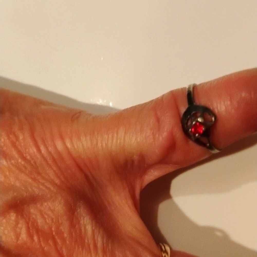Cute 925 pinky ring with a moon and star design and red crystal